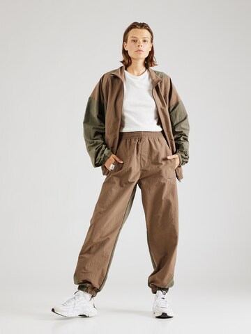 ReebokTapered Hlače - zelena boja