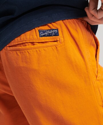 Regular Pantalon Superdry en orange