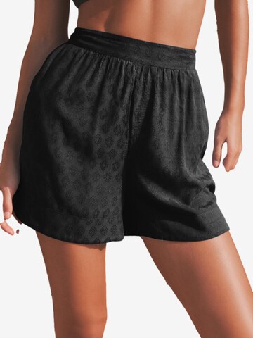 Next - Loosefit Pantalón en negro: frente