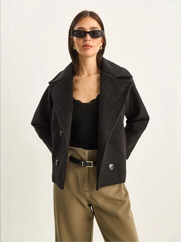 Bianco Lucci Mäntel in Schwarz