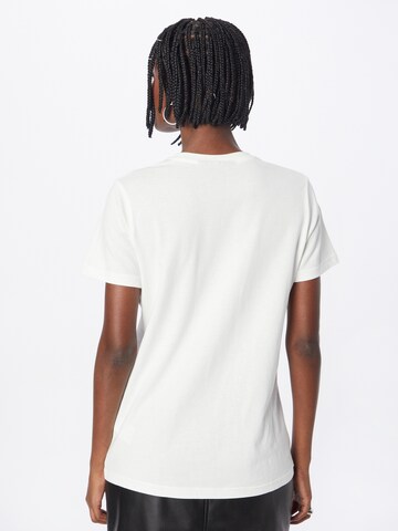 T-shirt fonctionnel PEAK PERFORMANCE en blanc