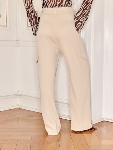 Ema Louise x ABOUT YOU Regular Pleat-Front Pants 'Lena' in Beige