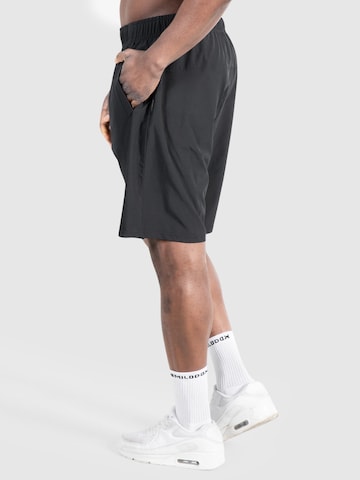 Loosefit Pantalon de sport 'Kenley' Smilodox en noir