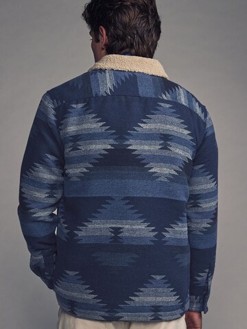 Next Tussenjas in Blauw