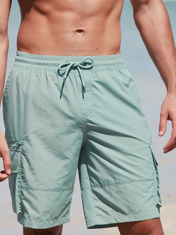 Shorts de bain Next en vert : devant