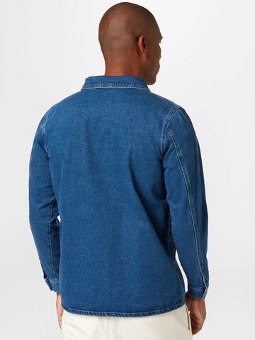 LMTD جينز مضبوط قميص بلون أزرق