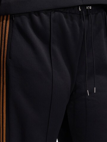 Regular Pantaloni 'IVP SUIT PANT' de la ADIDAS ORIGINALS pe negru