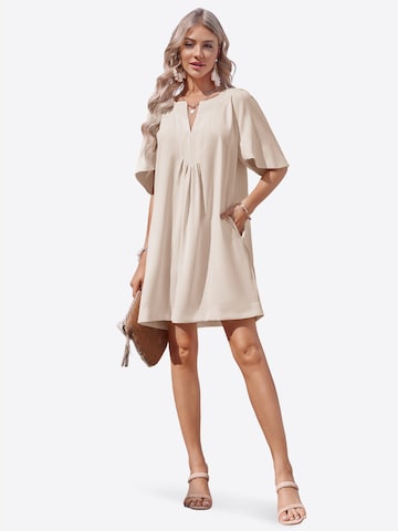 Rochie de la Imily Bela pe bej