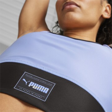 PUMA Sporttop in Lila