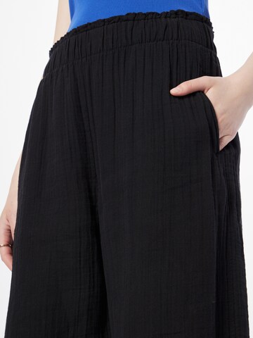 GAP Široke hlačnice Hlače 'GAUZE' | črna barva