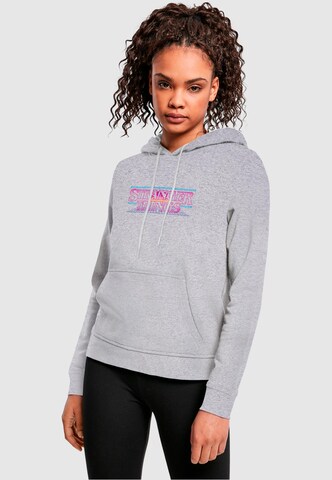 ABSOLUTE CULT Sweatshirt 'Stranger Things - Retro' in Grau: Vorderseite