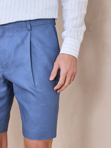 Next Loose fit Pleat-front trousers in Blue