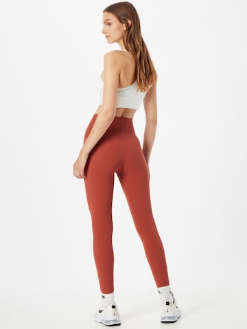 NIKE Skinny Sportovní kalhoty – hnědá