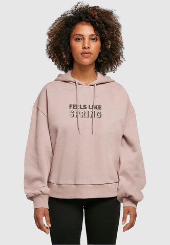 Merchcode Sweatshirt 'Spring - Feels Like' in Roze: voorkant
