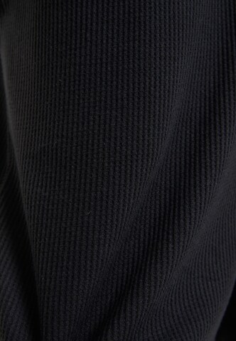 Urban Classics - Loosefit Pantalón en negro