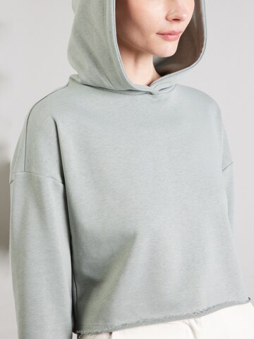 ABOUT YOU - Sudadera 'Riley' en verde