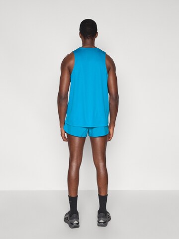 ASICS Normální Sportovní kalhoty – modrá