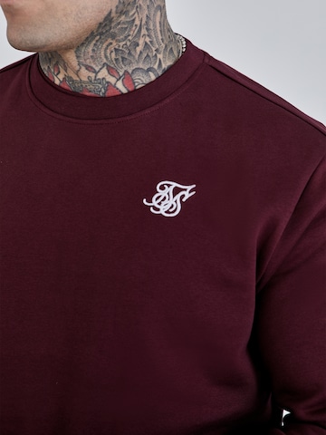 Pull-over SikSilk en rouge