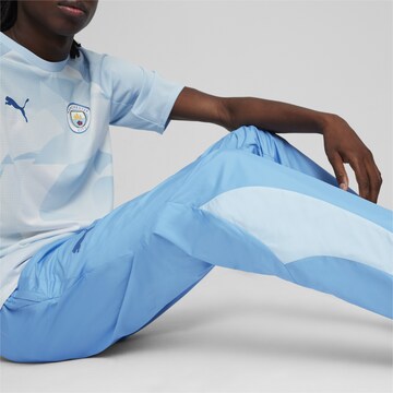 PUMA Regular Workout Pants in Blue