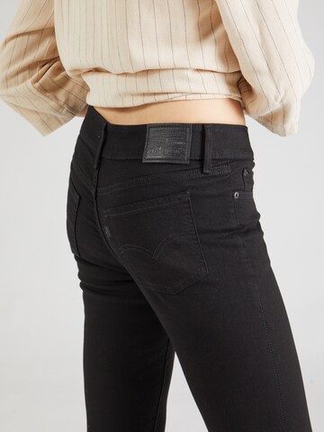 LEVI'S ® Skinny Jeans '711™' in Schwarz