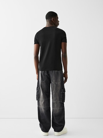 Loosefit Jeans cargo Bershka en noir