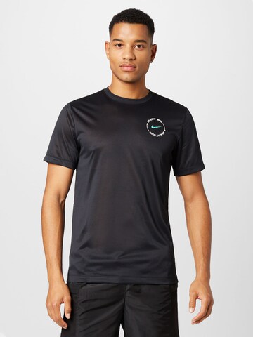 NIKE - Camiseta funcional en negro: frente