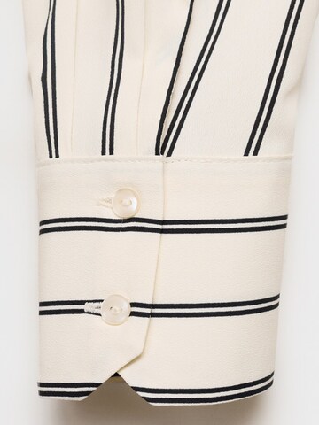 MANGO Bluse i beige