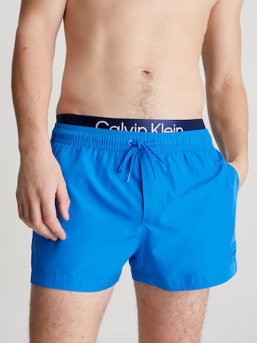 Calvin Klein Swimwear Board Shorts in Blue: front