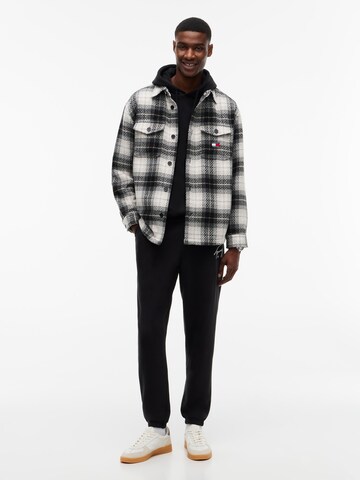 juoda Tommy Jeans Siaurėjantis Kelnės 'SIGNATURE'