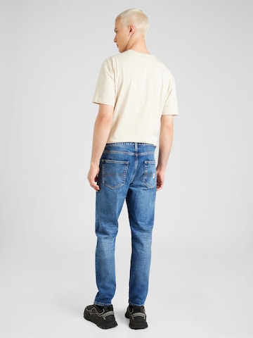 Tommy Jeans Regular Jeans 'DAD' in Blue