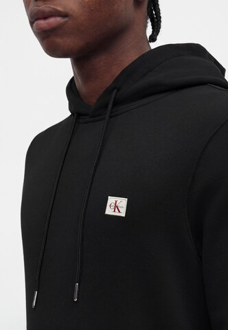 Bluză de molton de la Calvin Klein Jeans pe negru