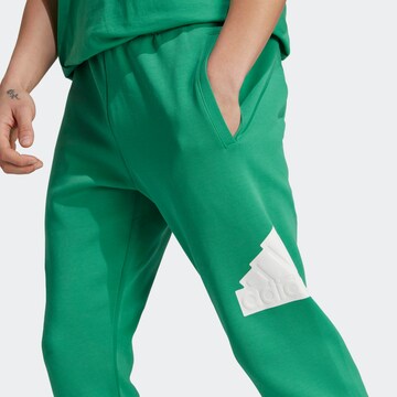 ADIDAS SPORTSWEAR Tapered Workout Pants 'Future Icons Badge Of Sport' in Green