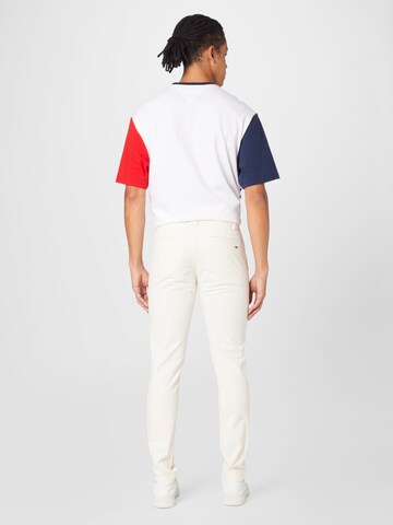 Tommy Jeans - Slimfit Calças chino 'SCANTON' em branco