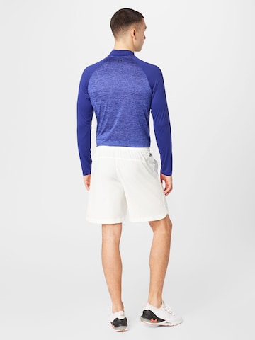 Regular Pantaloni sport de la UNDER ARMOUR pe bej