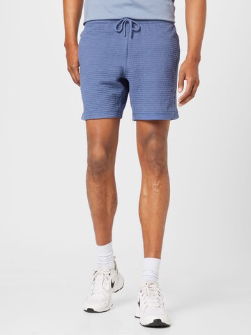 NIKE Regular Sports trousers in Blue: front