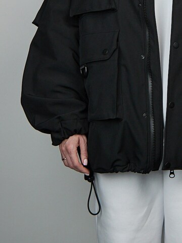 QWX2 Functionele jas 'Oversized Softshell Jacket – Structured / Weather-Resistant' in Zwart