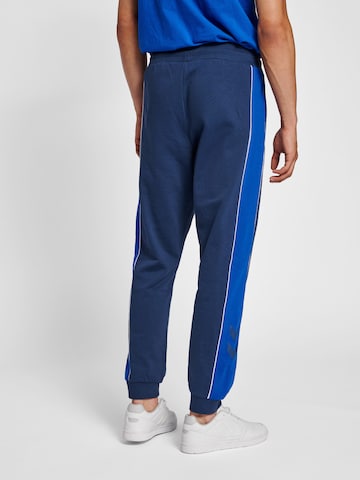 Hummel Tapered Sporthose in Blau