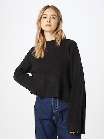 Pull-over Calvin Klein Jeans en noir : devant