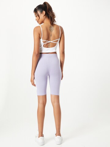 Hummel Skinny Sportbroek 'Legacy' in Lila