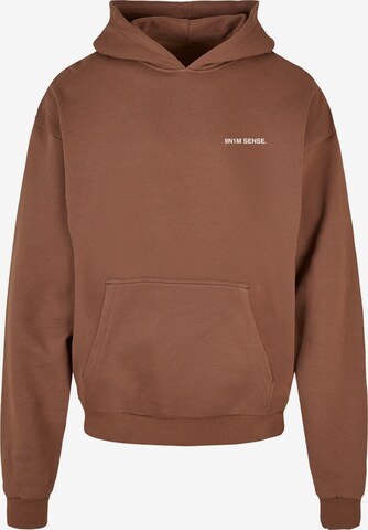 9N1M SENSE Sweatshirt 'Blazing Horizon' in Bruin: voorkant