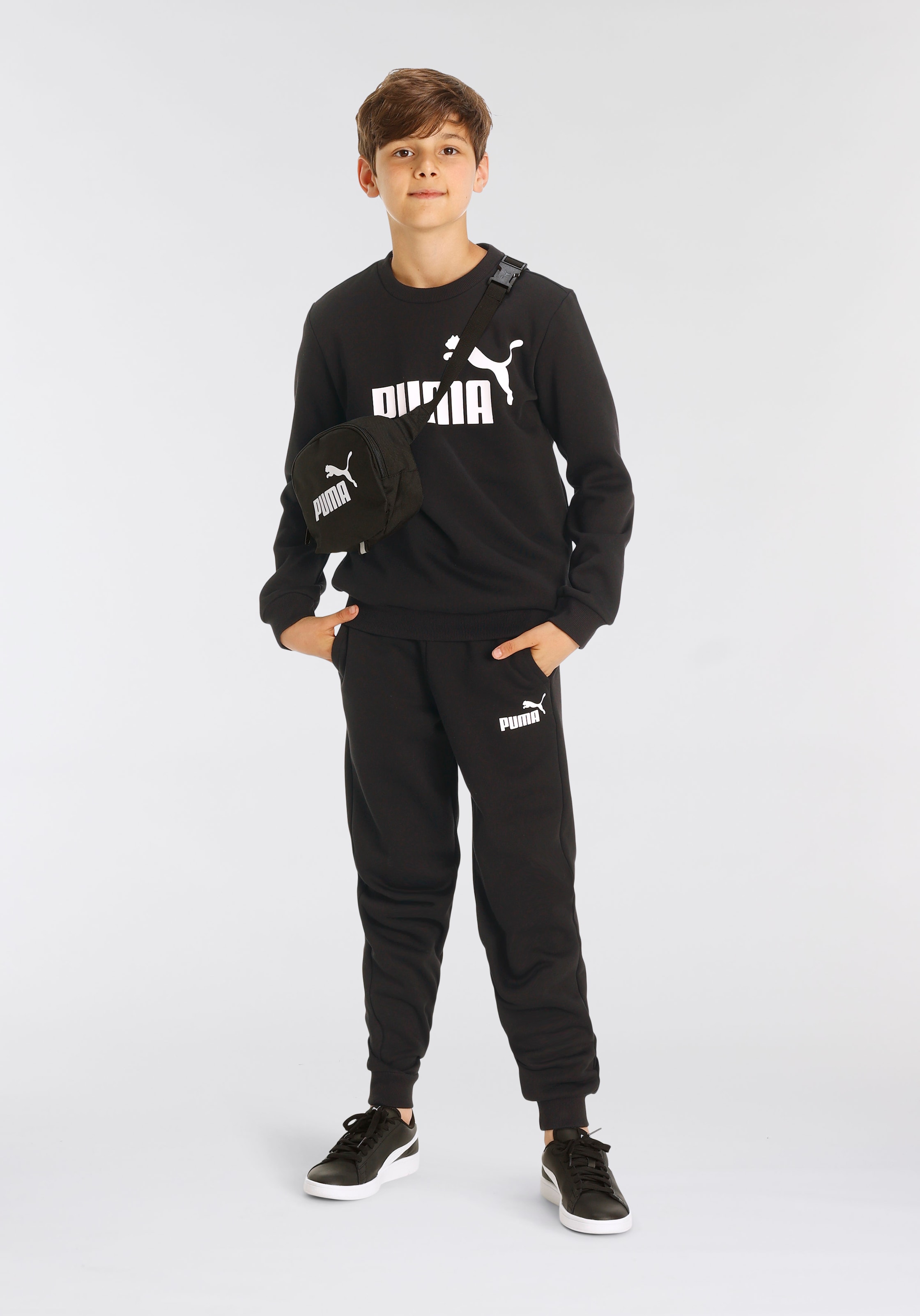 PUMA Tracksuit in Black ABOUT YOU