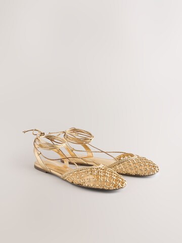 Next Ballerinasko med rem 'Forever Comfort' i guld