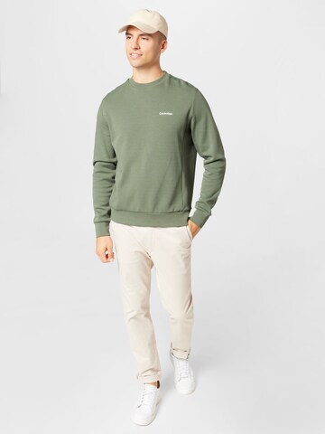 Bluză de molton de la Calvin Klein pe verde