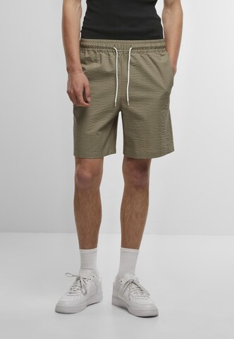 Regular Pantalon Urban Classics en vert : devant