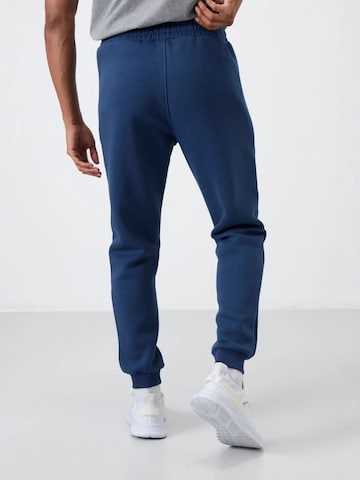 Regular Pantalon de sport Tommy Life en bleu
