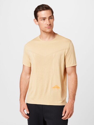 NIKE Functioneel shirt 'Rise' in Beige: voorkant