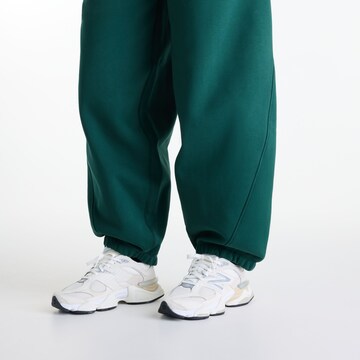 new balance - Loosefit Pantalón en verde