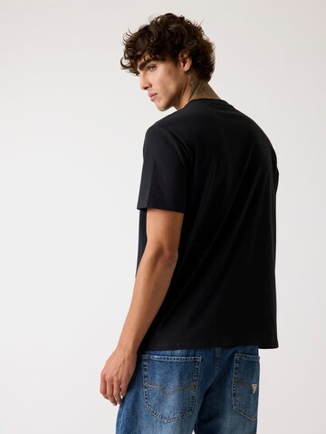 GUESS T-Shirt in Schwarz