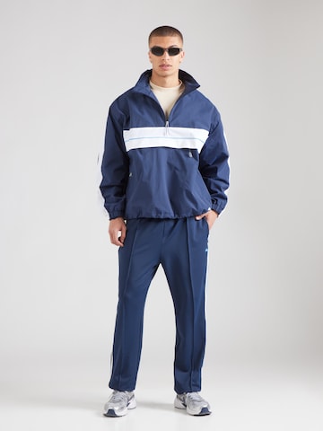 ELLESSE Демисезонная куртка в Синий