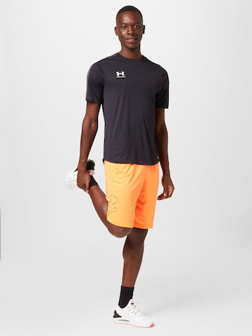 UNDER ARMOUR Широка кройка Спортен панталон в оранжево